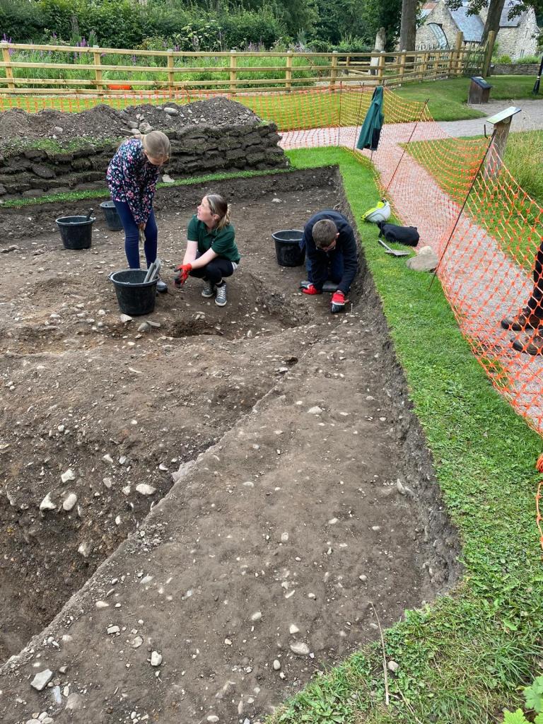 David is digging in the trench at Greenfield Heritage Park.