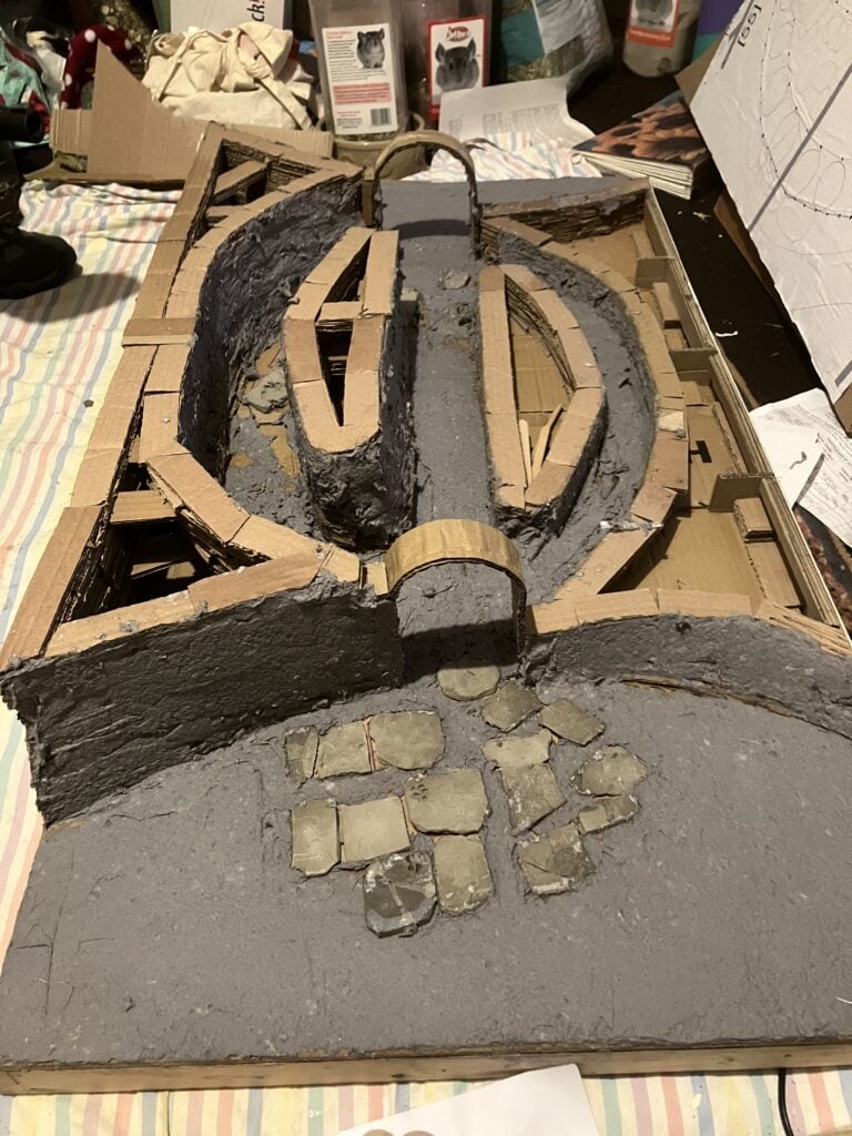 A table-top replica of a post-medieval kiln made from cardboard and clay