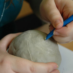 Carving the petroshere pattern with a modelling tool.