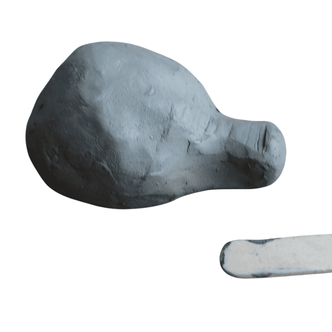 A small dome of clay with a whistle-like nozzle.