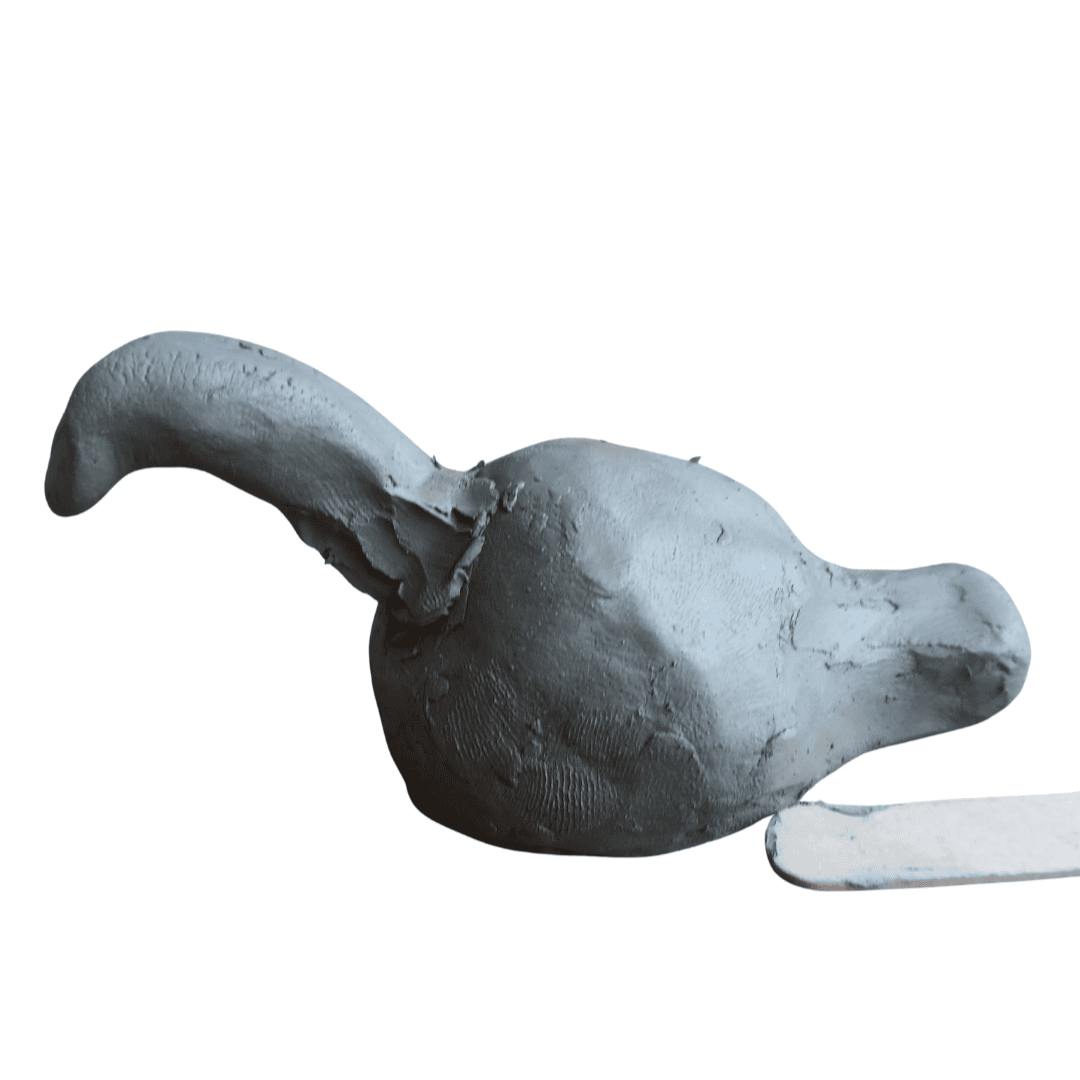 A small bird shape made from clay.