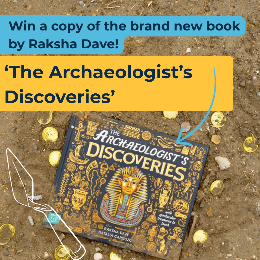 Photo of book in soil with gold coins around it